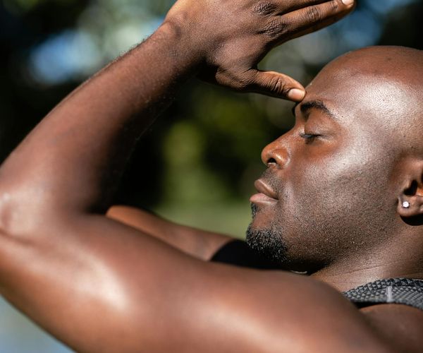 Person in a calm, meditative state, symbolizing inner balance and focus.